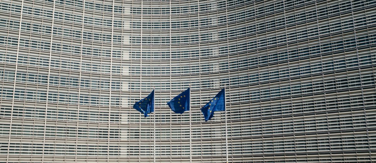EU flags outside the European Commission in Brussels. Illustrative stock photograph; not a photograph of the reported event.